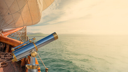 Banner with an old sailing boat towards dreams and adventures, with copy space for text and an...
