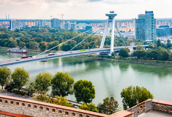 Fototapeta na wymiar Bridge over the Danube river and aerial view of Bratislava, Slovakia