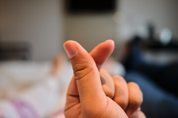 Mini heart sign gesture at the hotel room