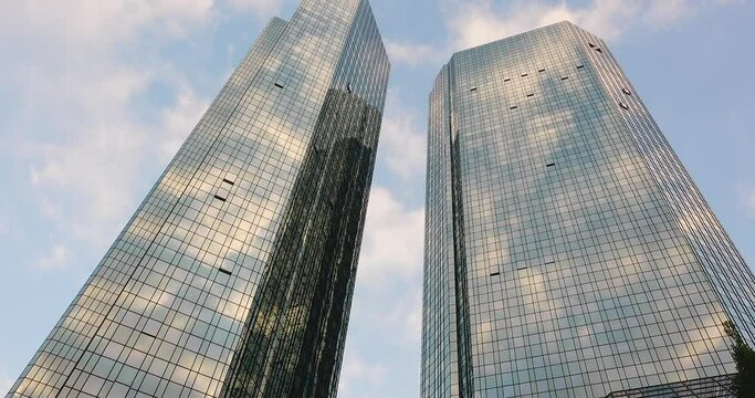 2k, Frankfurt skyscrapers facade with clouds reflections in the glass