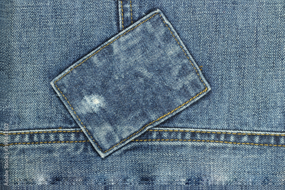 Wall mural denim background with rectangular patch copy space.