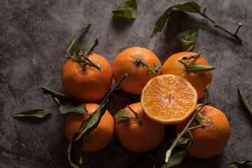 Top view shot of oranges with water droplets on them