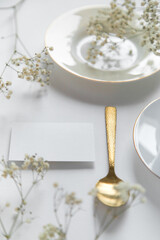 christmas table setting with christmas decorations. blank white letterhead