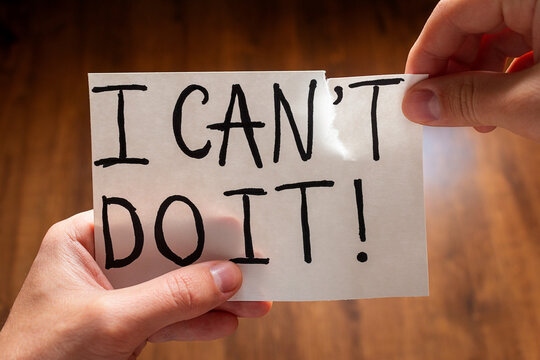 Man tears the word can't to read I can do it concept motivation