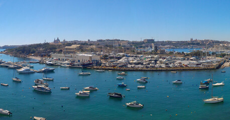 Fototapeta na wymiar Boats moored in marsamxett harbour opposite Manoel Island Marina, Gzira, Malta.