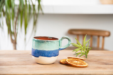hand made ceramic coffee cup on the table