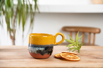 hand made ceramic coffee cup on the table