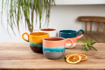 hand made ceramic coffee cups on the table