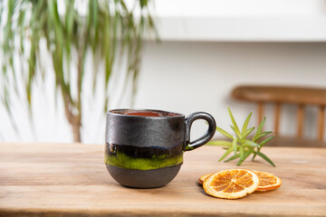 hand made ceramic coffee cup on the table