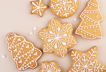 Christmas gingerbread on a soft pastel background with space for text