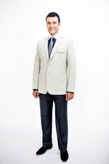A man in a classic suit. Studio photo on a white background. Snapshot as for a catalog.