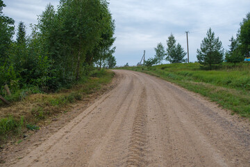 endless beautiful country gravel road in perspective