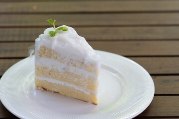 Divided coconut cake To fit customer needs Ready to be served on a wooden table