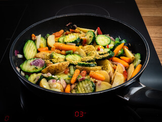 Vegetable ragout cooking in frying pan
