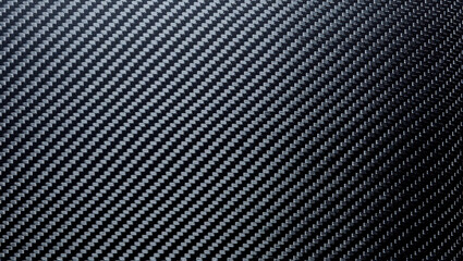 Abstract dark carbon fiber texture Background