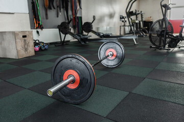 Close up of a barbell in a modern gym. Functional cross training