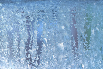 Frozen drops of condensation on a window, a sharp drop in temperature, sharply frozen drops of...