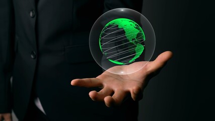 Human hand holding earth globe holographic technology . Futuristic visualization for virtual reality and augmented reality .
