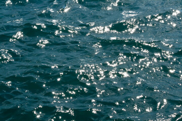 Sea water with sun glitters 