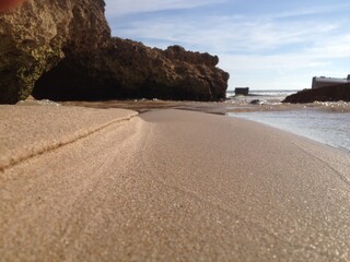 close up sand beach with coral background