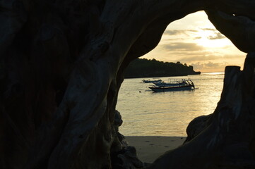 a boat cruising trapped by wood frame
