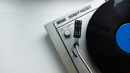 Pov vintage record player on white background. Group of people relaxing, listening music.