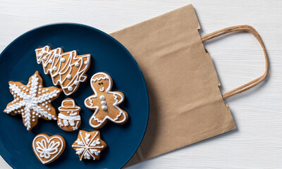 blue biscuit gift wooden background new year cookies white top view copy space