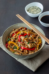 Noodles with pork, pepper and soy sauce. Asian food. Wok.