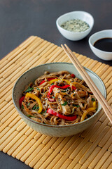 Noodles with pork, pepper and soy sauce. Asian food. Wok.