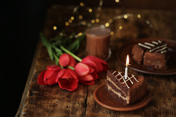  Chocolate cake with candles. berries and flowers. Birthday. Flat lay. High quality photo