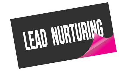 Obraz premium LEAD NURTURING text on black pink sticker stamp.