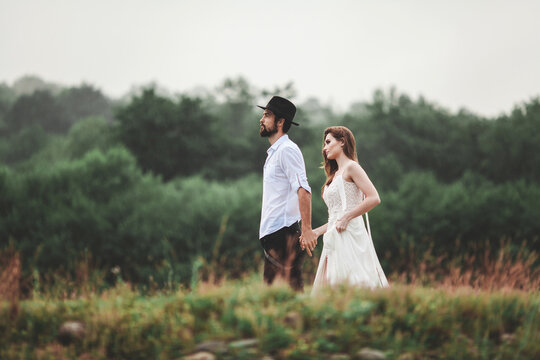 Beautiful young couple. Wedding photo session outdoors in the mountains. Happy couple. New family.
