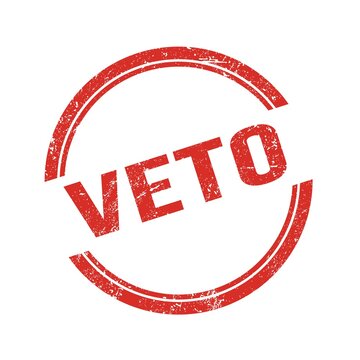 VETO text written on red grungy round stamp.
