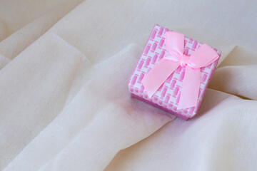 Woman packing valentine day gift box.Concept love, wedding, romance, Valentine's Day. Space for writing.