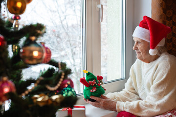 Elderly person. Christmas New Year. Portrait. Close-up..