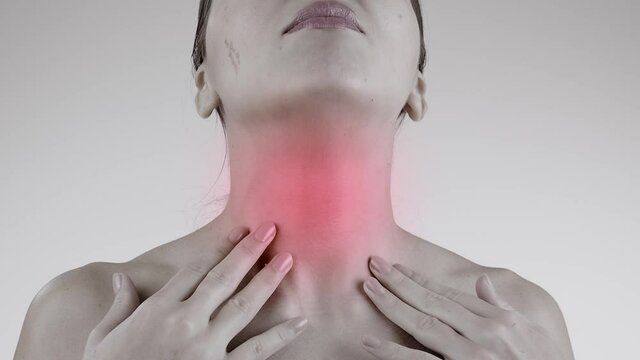 Sore throat. Woman with pain throat