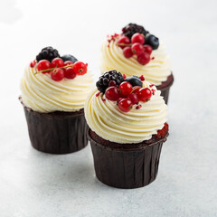 Red velvet cupcakes on white background