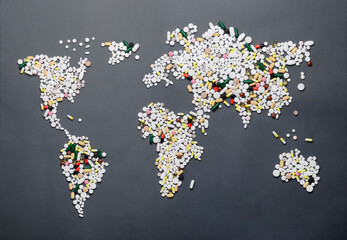 World map of pills and capsules, medicines in the form of mothers and islands © Alex