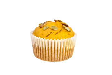 Muffin with pumpkin seeds isolated on white background