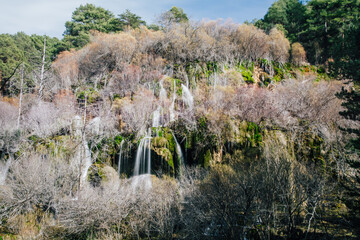 Cuervo river source waterfalls with vegetation Cuenca Spain