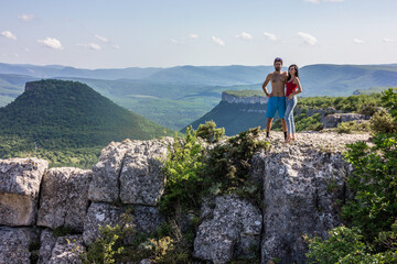 Beautiful young couple. Wedding photo session outdoors in the mountains. Happy couple. New family.