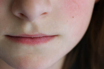 Close up of mouth of young girl