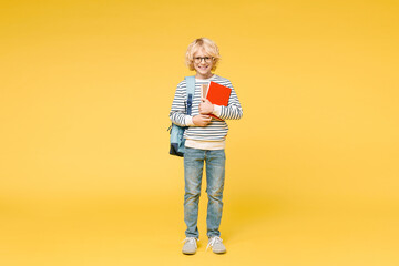 Full length of funny little male kid teen boy 10s years old in striped sweatshirt eyeglasses...