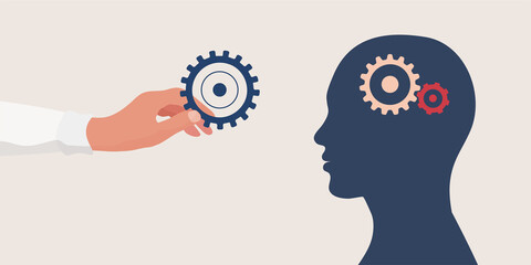 Mental health concept.Therapist or doctor hand holding a gear for as a symbol of mental care.Head with cogs.Psychology and psychiatry. Depression.Stress.Mind.Disease.Psychotherapy.Mood