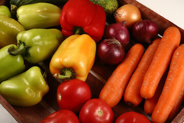 Juicy vegetables on a wooden tray