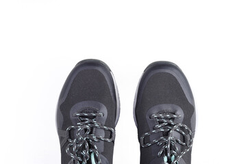 gray athletic shoes on white background