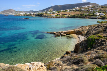 Fototapeta na wymiar Picturesque Paros Bay with crystal and turquoise water. Paros Island, Cyclades, Greece