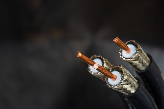Stripped coax cable closeup on dart soft background
