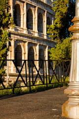 Fototapeta premium landscape with colosseum, street lamp and road