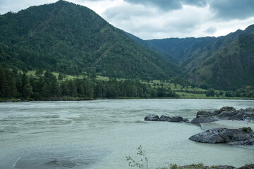Amazing view of Altay Republic. Katun River and mountains.  Russian adventures. Mountain hiking in the Altai republic. Active holiday with family and friends. 